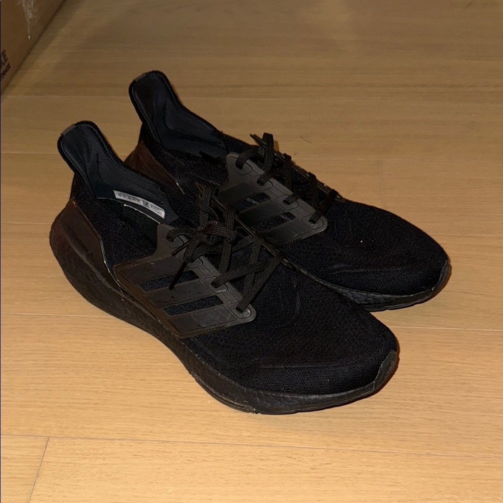 Adidas Black Athletic Shoes with Sleek Slip-On Design
